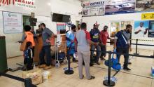 Assessment teams checked in at the airport before their departure to the islands.