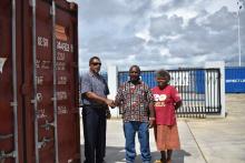 Mr Gorden handed over the two containers of clothing to Director Sammy and Mrs Tarileo in Santo. Mr Gorden handed over the two containers of clothing to Director Sammy and Mrs Tarileo in Santo.